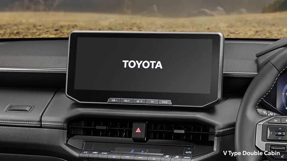 12.3" Head Unit with Smartphone Connectivity di dalam Toyota Hilux, ditampilkan untuk calon pembeli di Samarinda (promo hilux 2025)